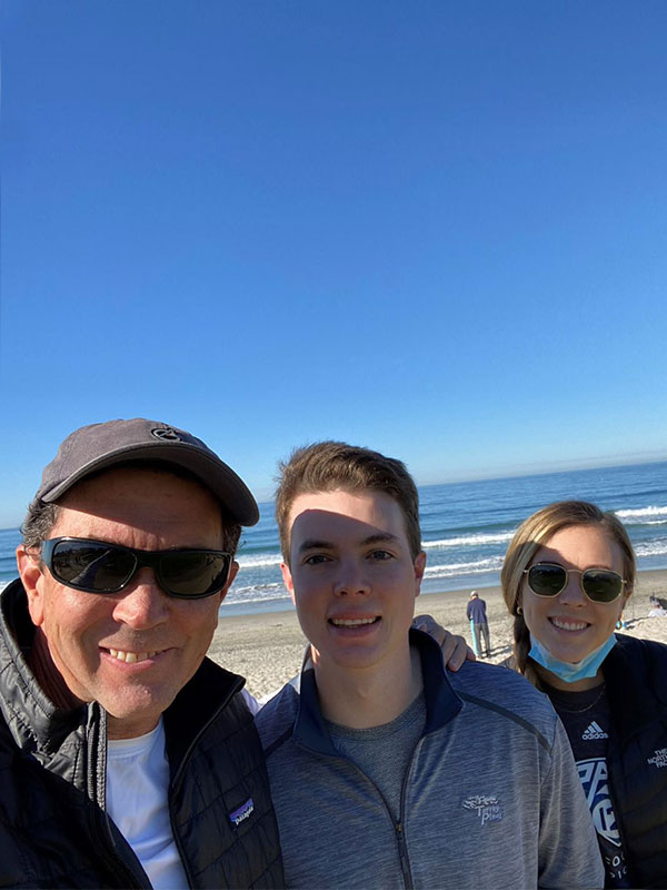 John with family on the beach