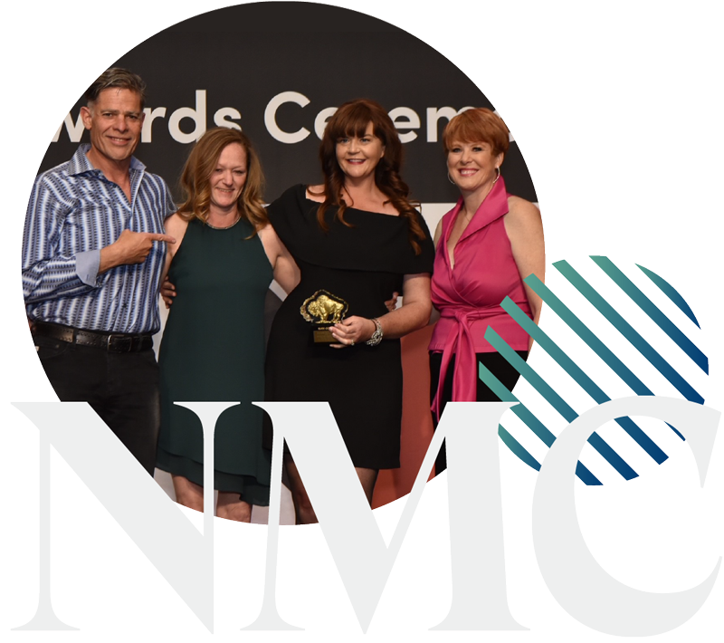 Photo of NMC receiving award