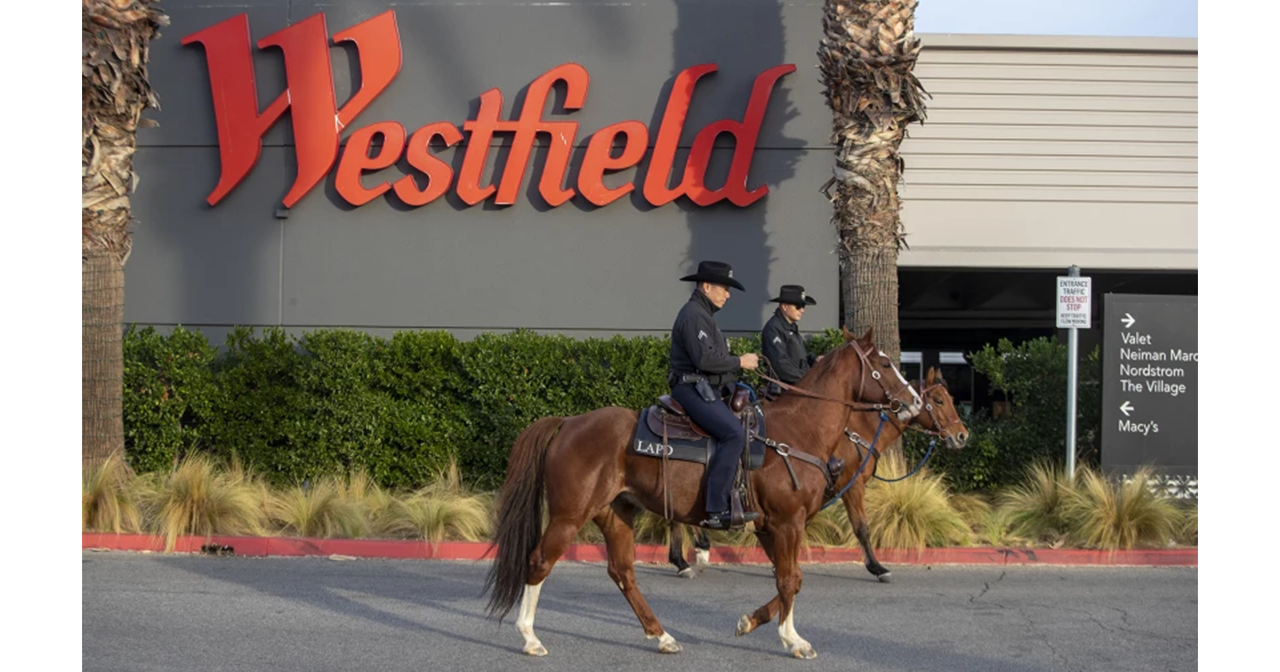 Two LAPD officers on horseback patrol the Westfield Topanga shopping mall in Canoga Park